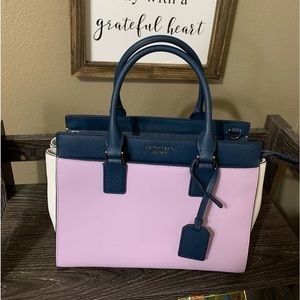 Kate Spade satchel. Tri color. New with tags. Crossbody strap.